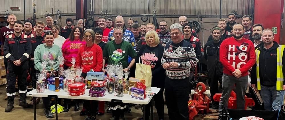 The Red Rooster Lifting team at their Christmas Jumper fundraiser for Inverurie Food Bank