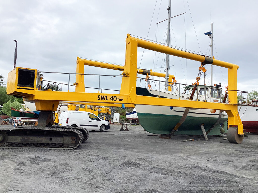 40-tonne boat hoist lifting vessel on slipway at UK boatyard