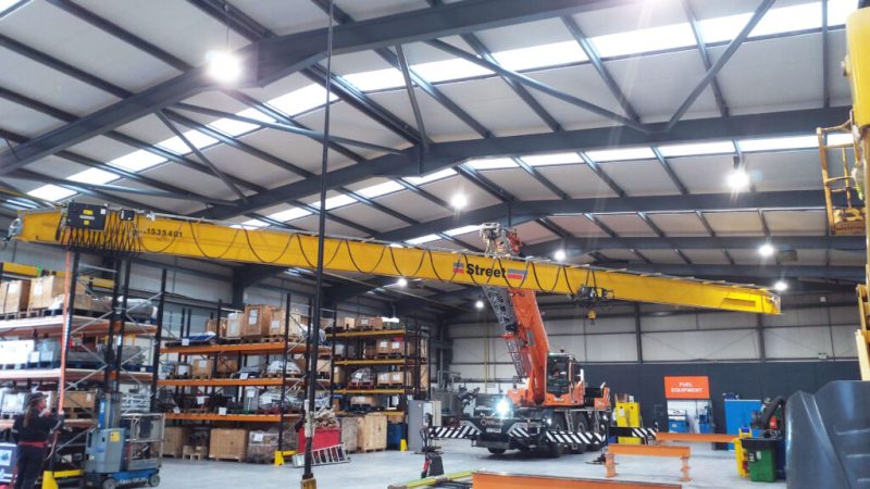2 tonne overhead crane installation in industrial workshop showing underslung crane and full span coverage during commissioning