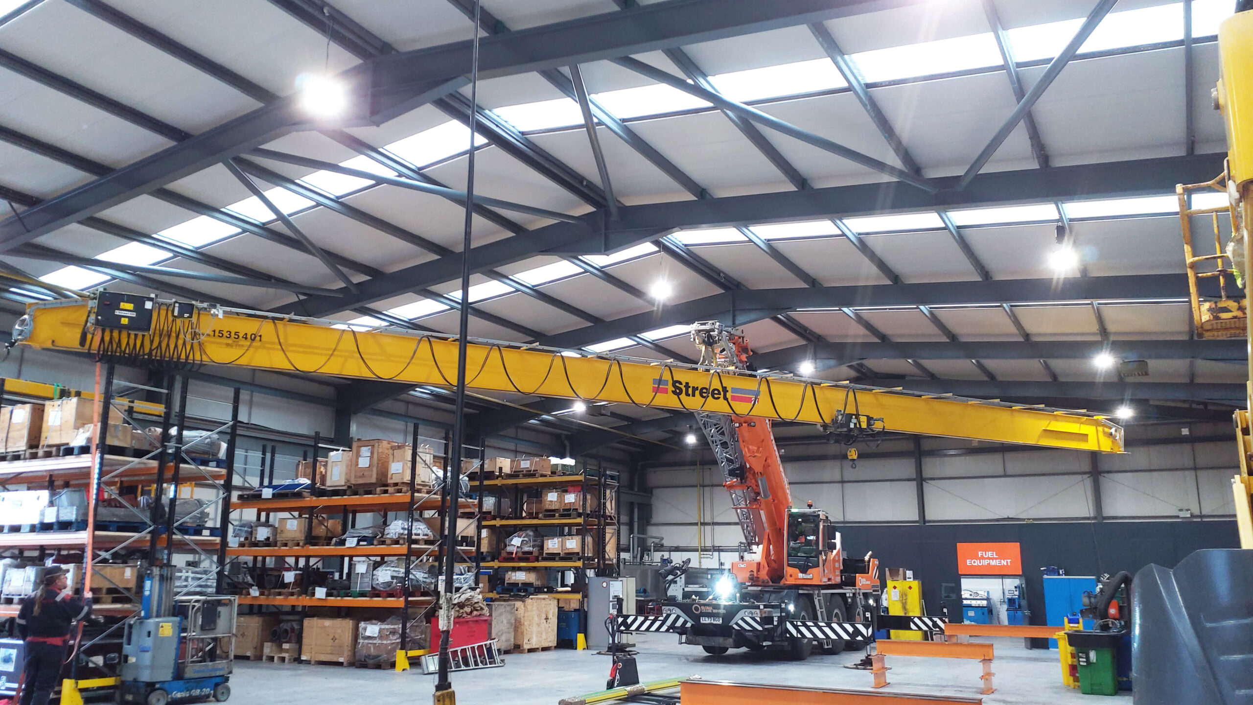 2 tonne overhead crane installation in industrial workshop showing underslung crane and full span coverage during commissioning