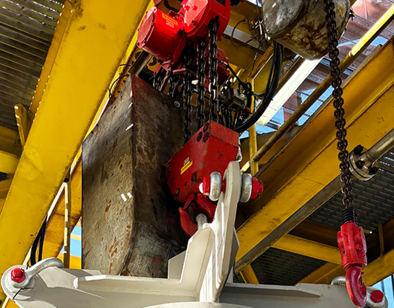 Red Rooster air hoist supporting turret swivel component removal during an offshore maintenance project