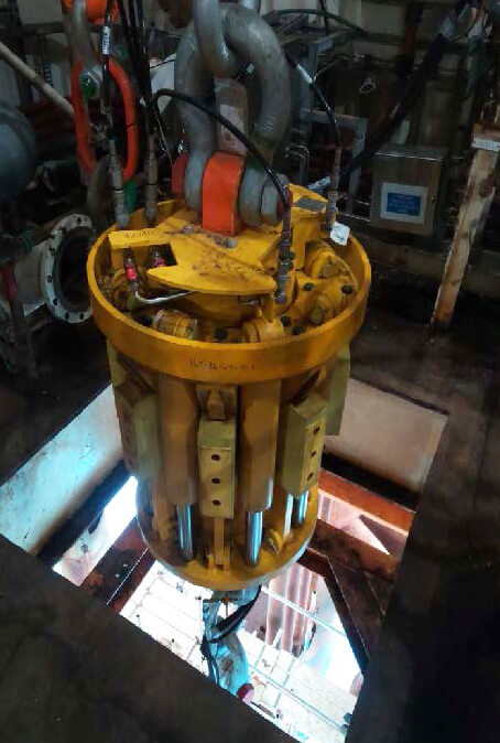 Offshore rigging setup with lifting equipment supporting caisson destruct operation