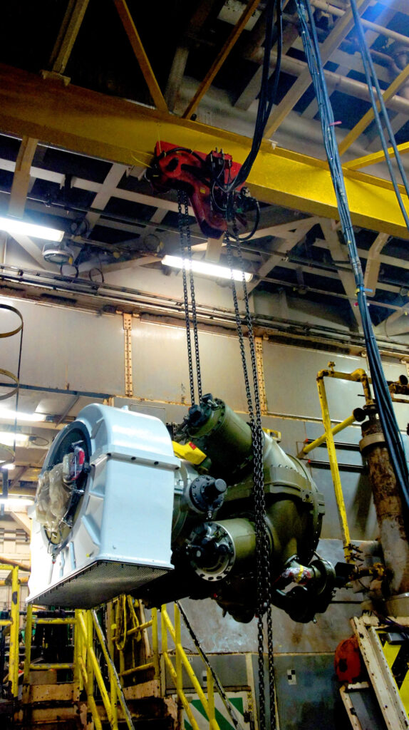 Gas turbine being handled with low headroom air hoist in restricted offshore maintenance area