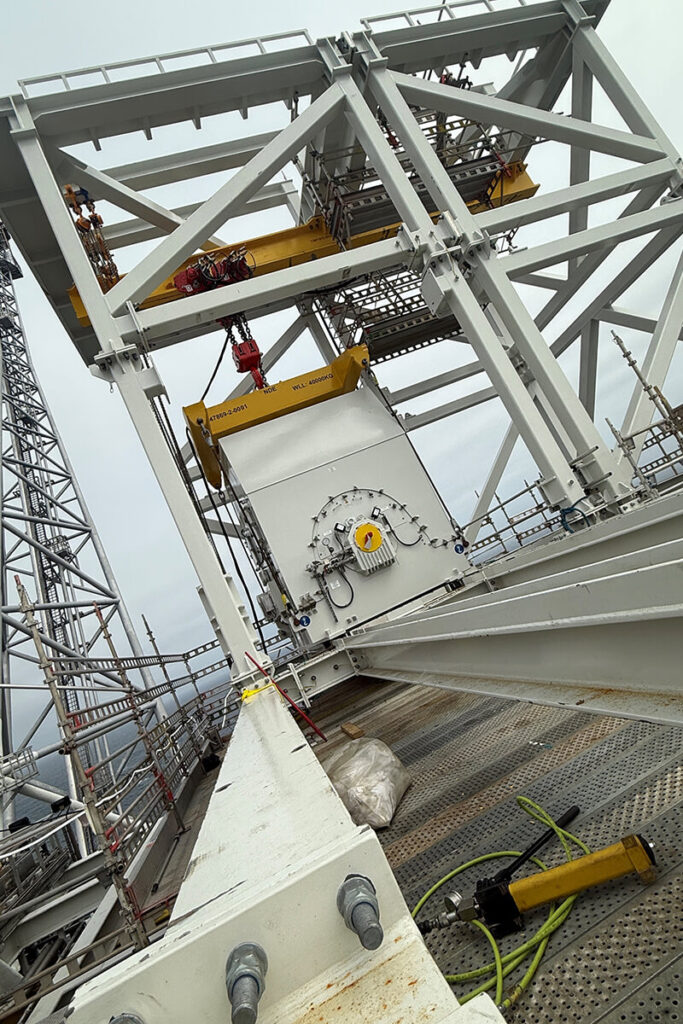 50 tonne air hoist and trolley positioning offshore motor equipment beneath a weather deck monorail in Norway